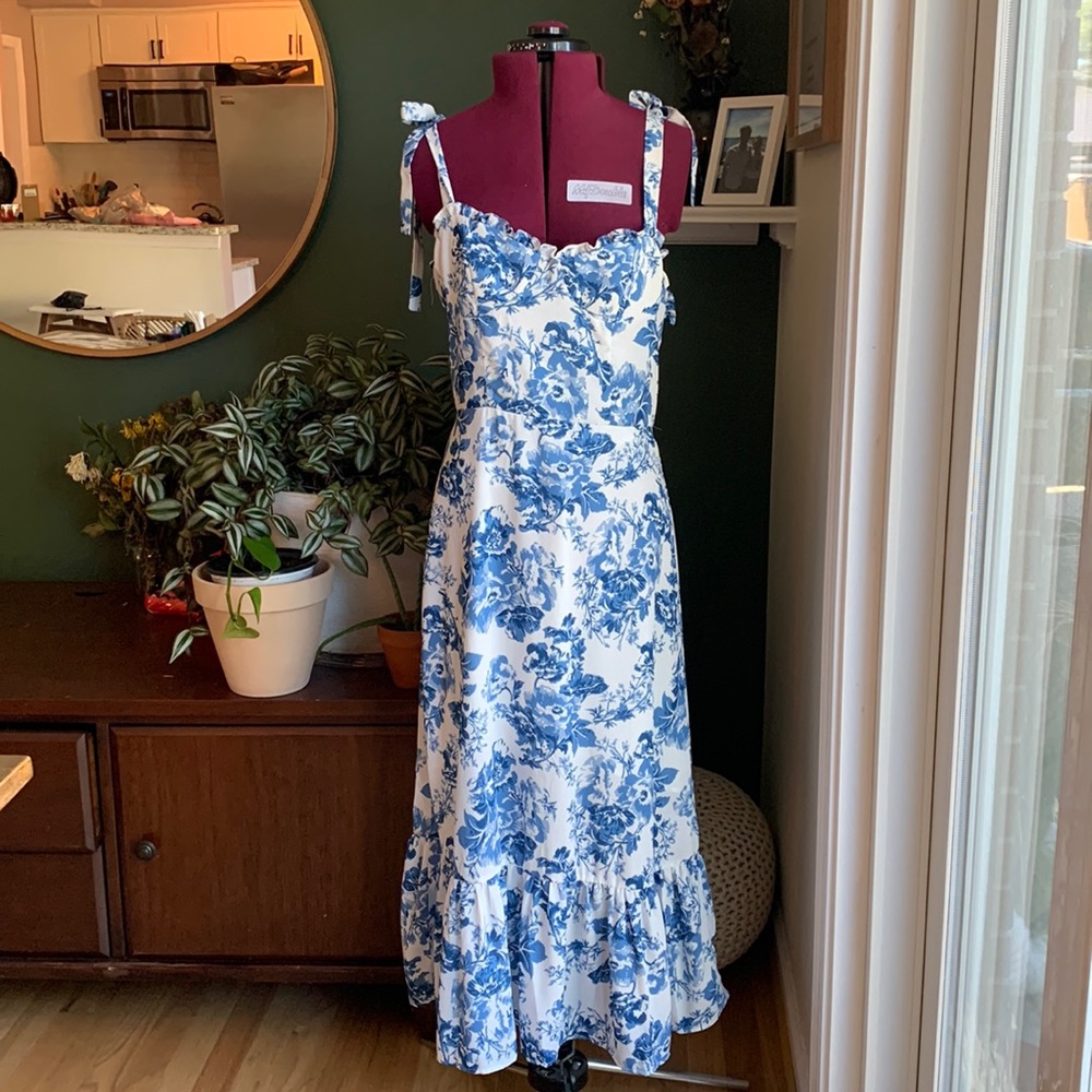 Brand new, never worn, with tags. Perfect dress for occasions!